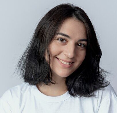 smiling young pretty caucasian girl looking camera isolated white background 141793 90221